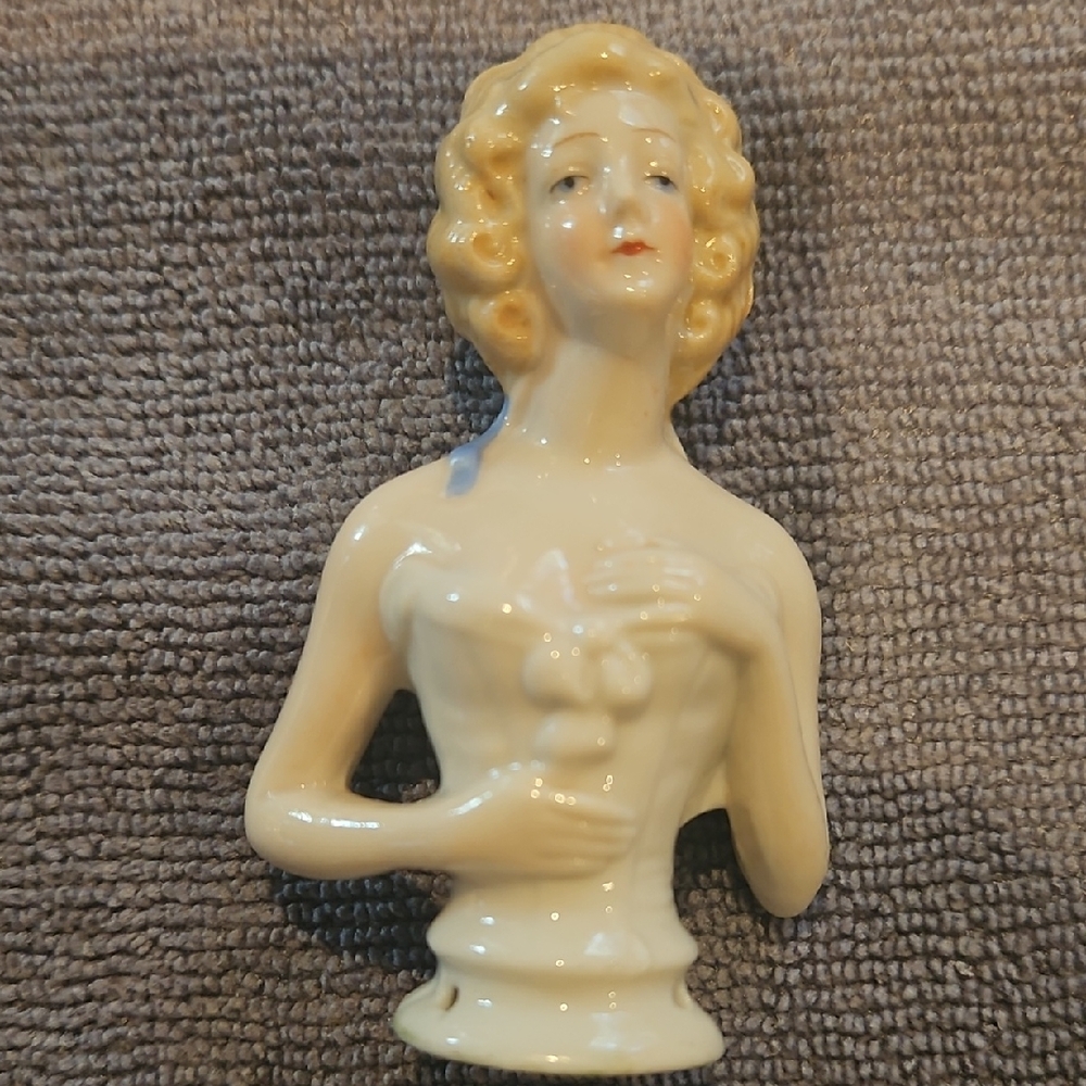 Elegant Cream Porcelain Figurine